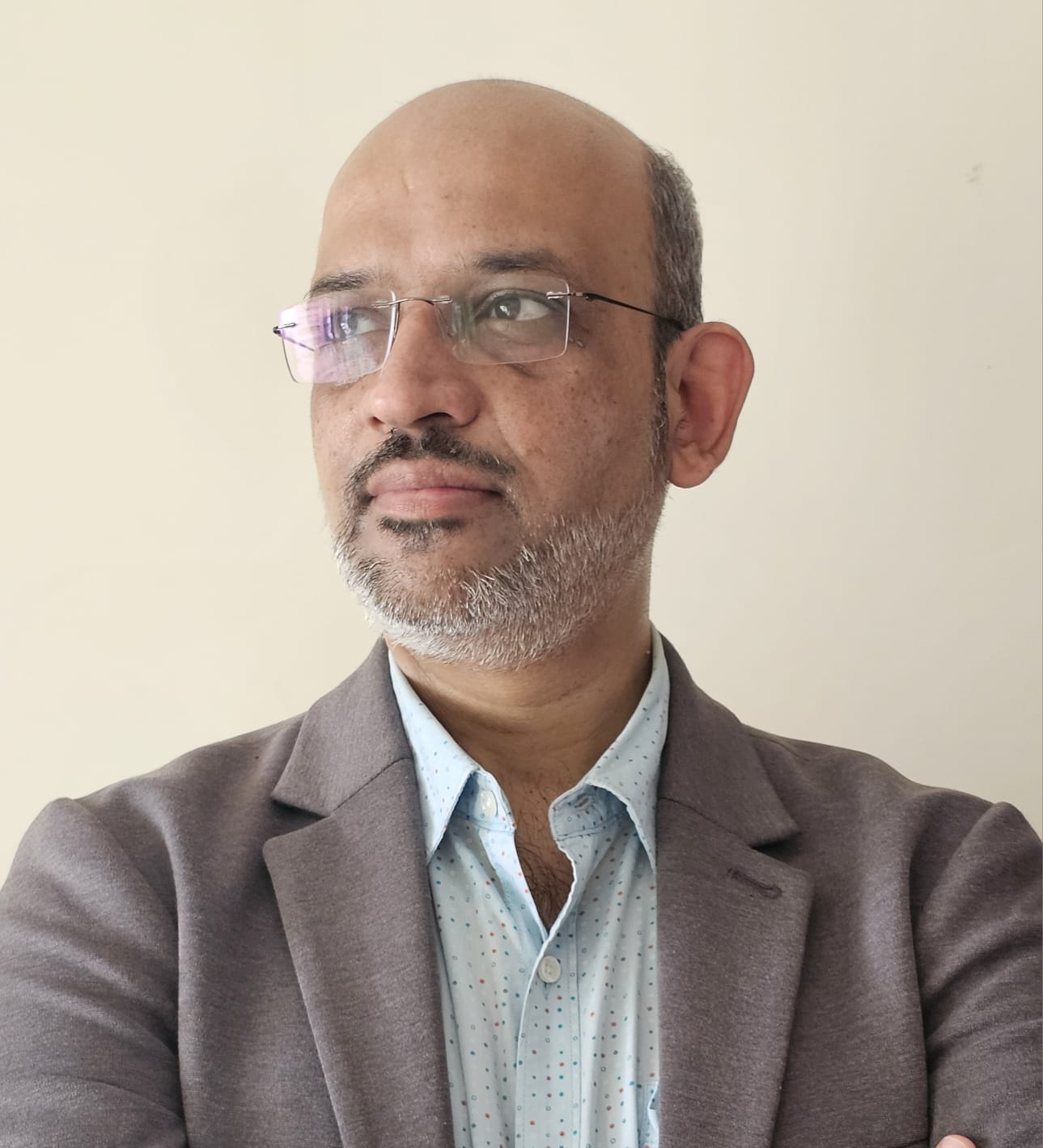 Mr. Huzefa Bala